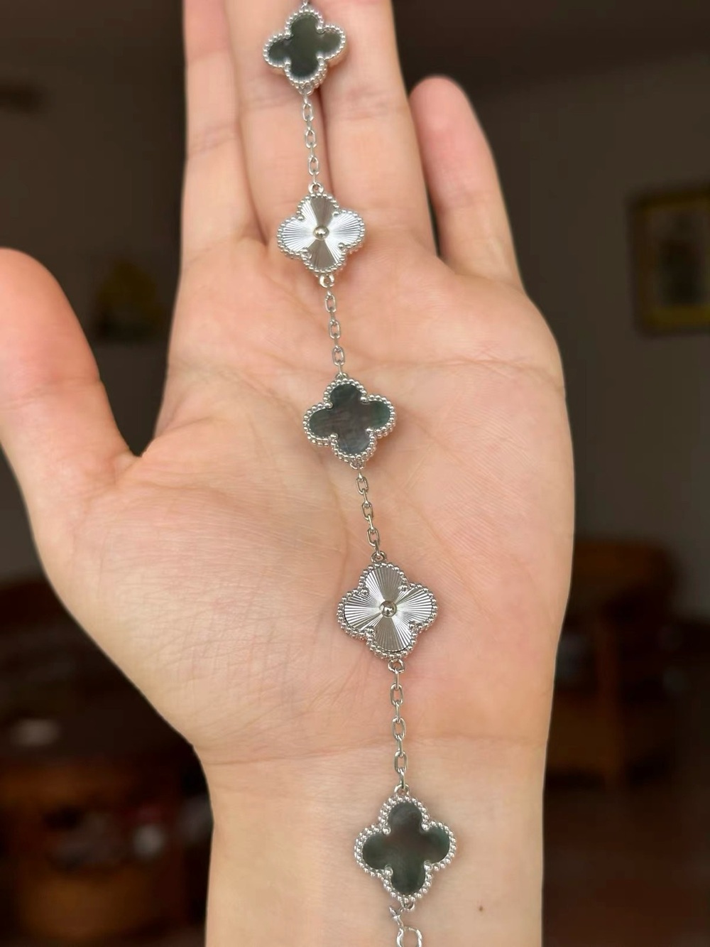 Silver Four-Leaf Motif Bracelet with Black Inlay